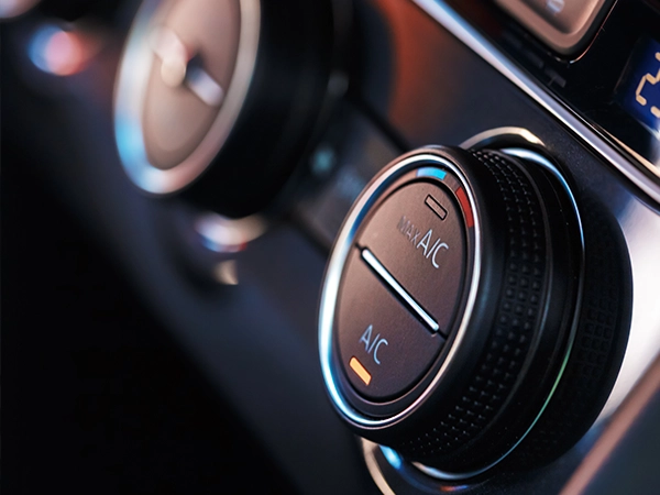 Close up of air conditioning controls in a car