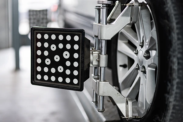 Wheel alignment being preformed up close